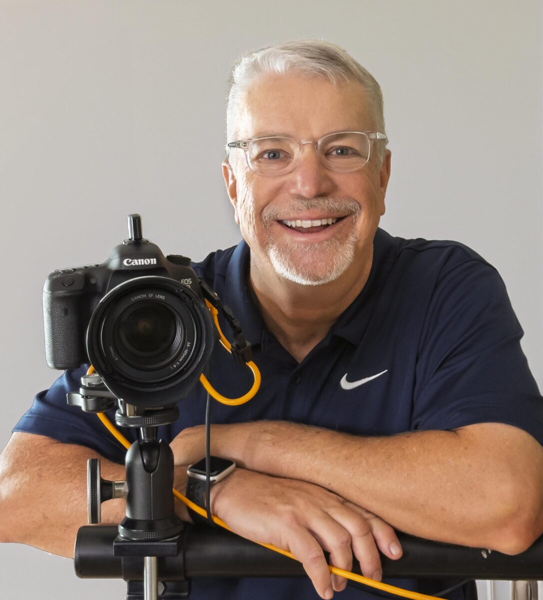 Camera Photo of Doug Mattice with his camera. He provides fine art business coaching for photographers and digital artists.